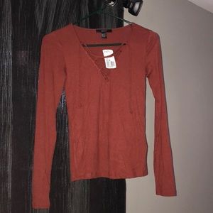 a red/brown shirt